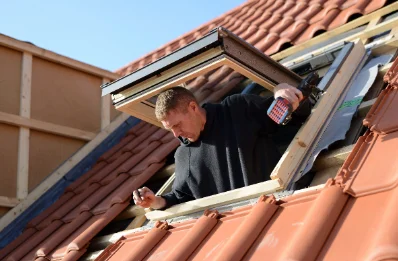Pose de fenêtres de toit Velux au Cours
